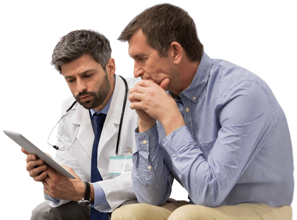 Doctor and a man looking at something on an iPad